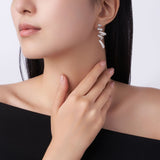 新款S925银欧式风莫桑石耳钉个性简约螺旋型长款S形状耳环女