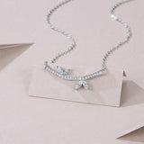 代发纯银笑脸蝴蝶结项链女锁骨链莫桑石白金吊坠