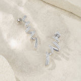 新款S925银欧式风莫桑石耳钉个性简约螺旋型长款S形状耳环女