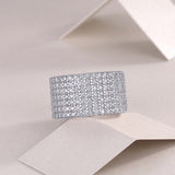 满圈豪镶纯银电镀白金豪镶戒指莫桑石闭口纯手工制作高级轻奢戒指