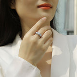 S925银圆形围镶莫桑石戒指女轻奢闭口精美奢华婚戒指环